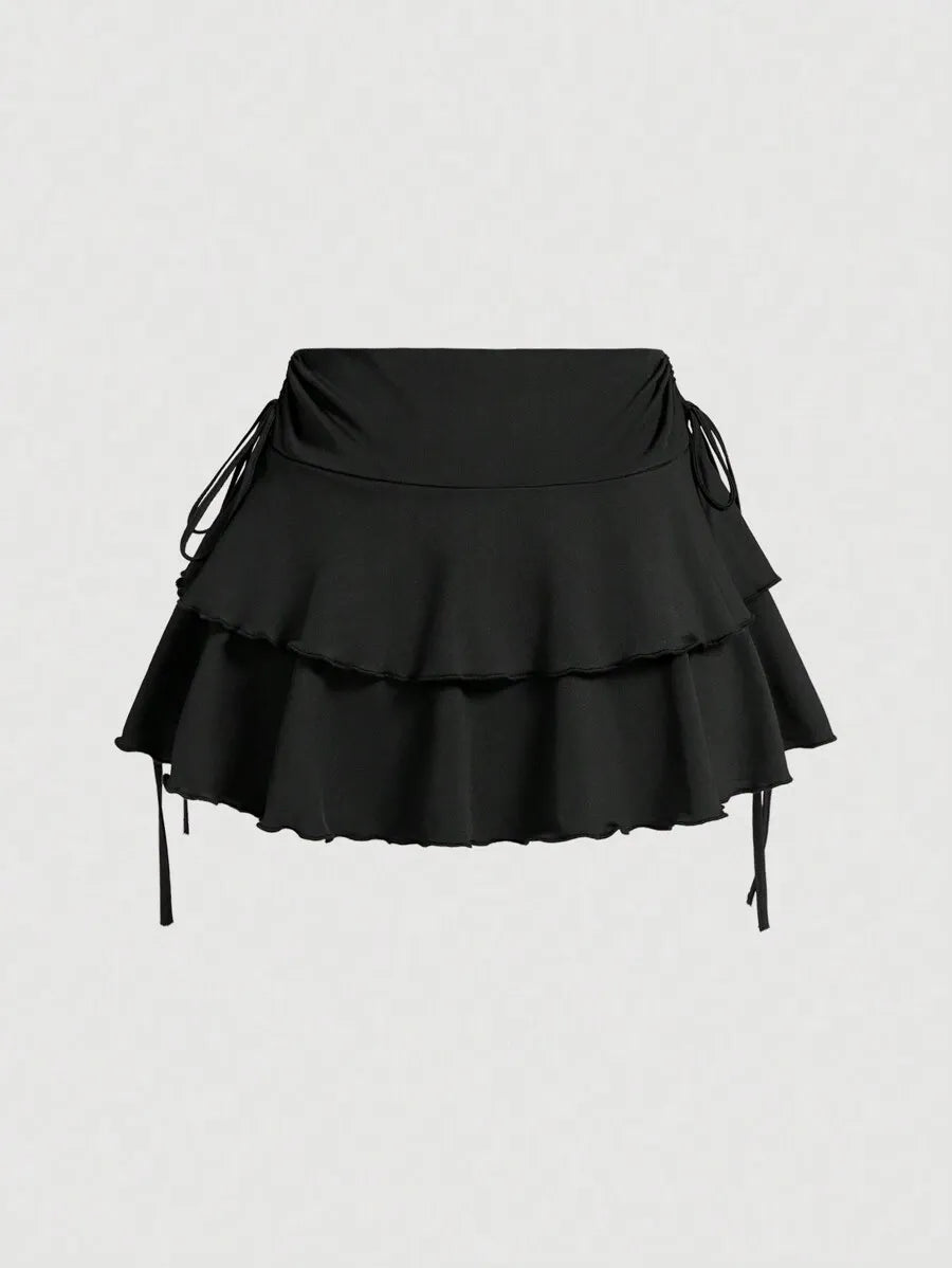 Side tie layered ruffle mini skirt – black flat lay