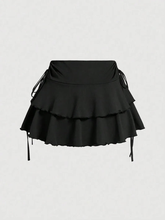 Side tie layered ruffle mini skirt – black flat lay